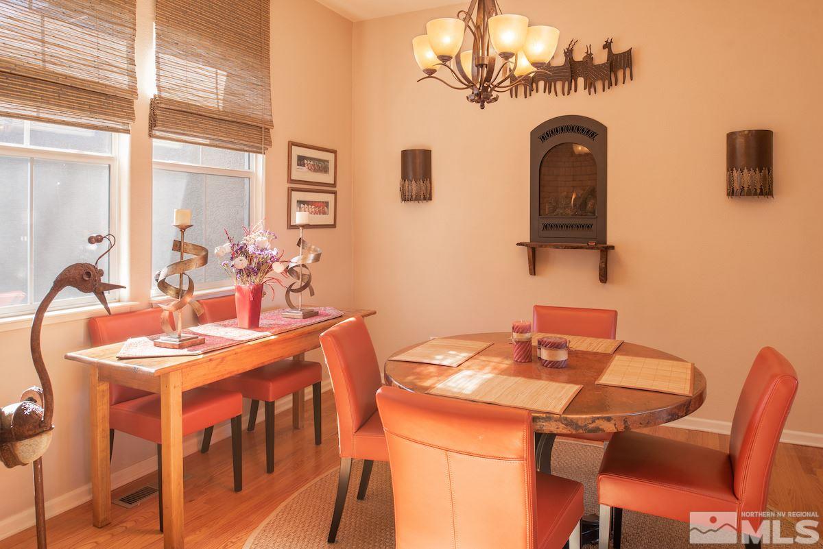 1673 Aspen Creek Road Reno, NV 89519 - Photo 13 of 40 a dining room with furniture and chandelier