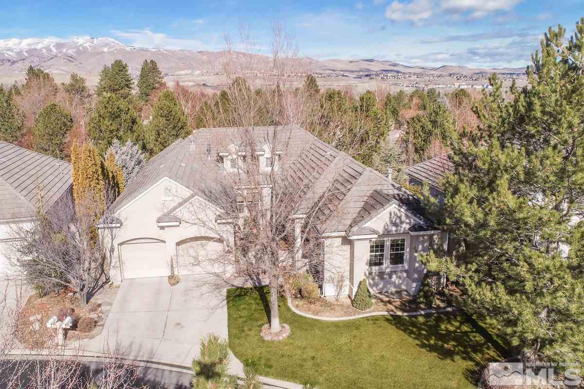 1673 Aspen Creek Road Reno, NV 89519 - Photo 2 of 40 a view of a house with a yard