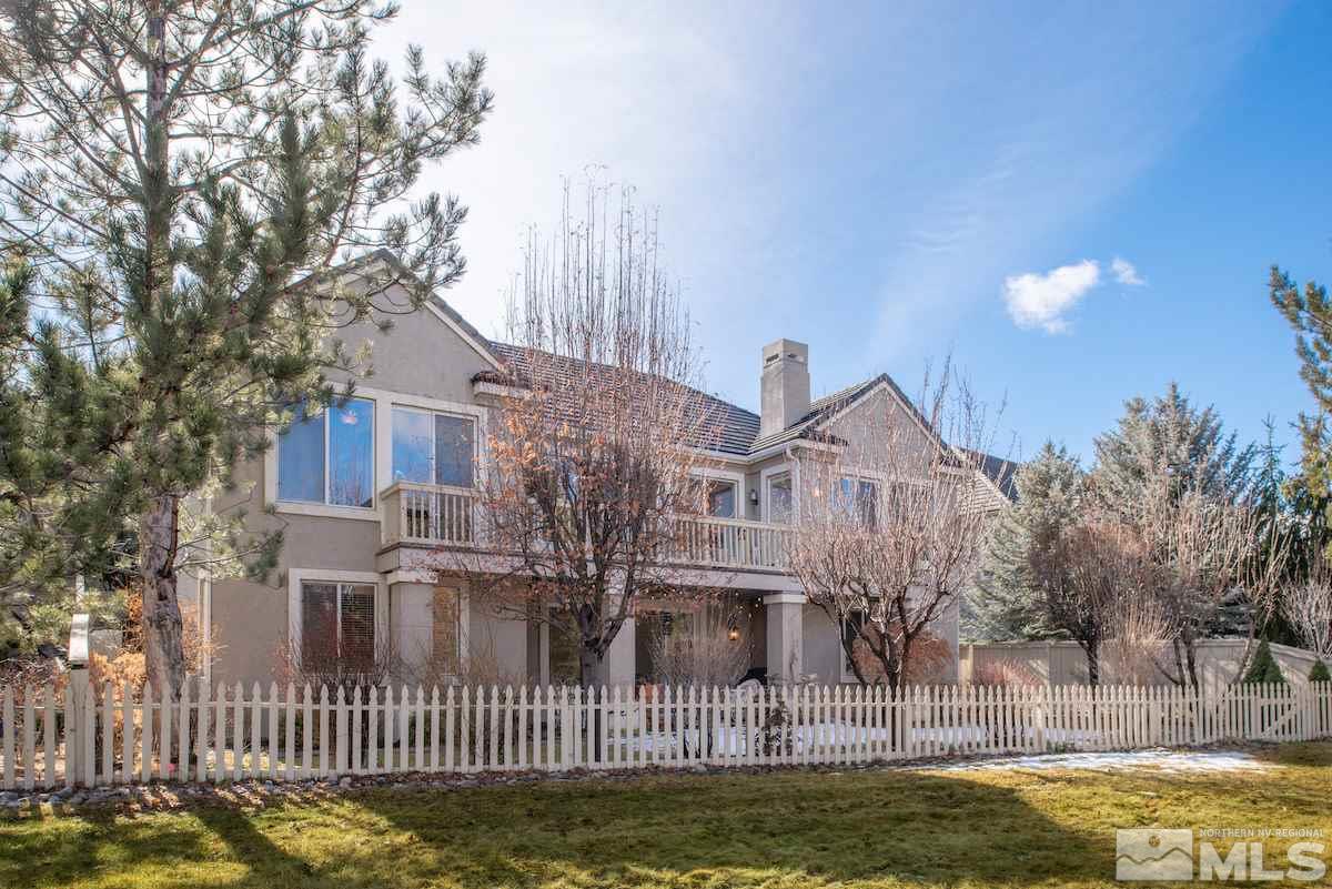 1673 Aspen Creek Road Reno, NV 89519 - Photo 31 of 40 a front view of a house with a garden