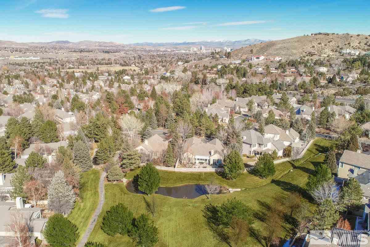 1673 Aspen Creek Road Reno, NV 89519 - Photo 34 of 40 an aerial view of residential houses with outdoor space