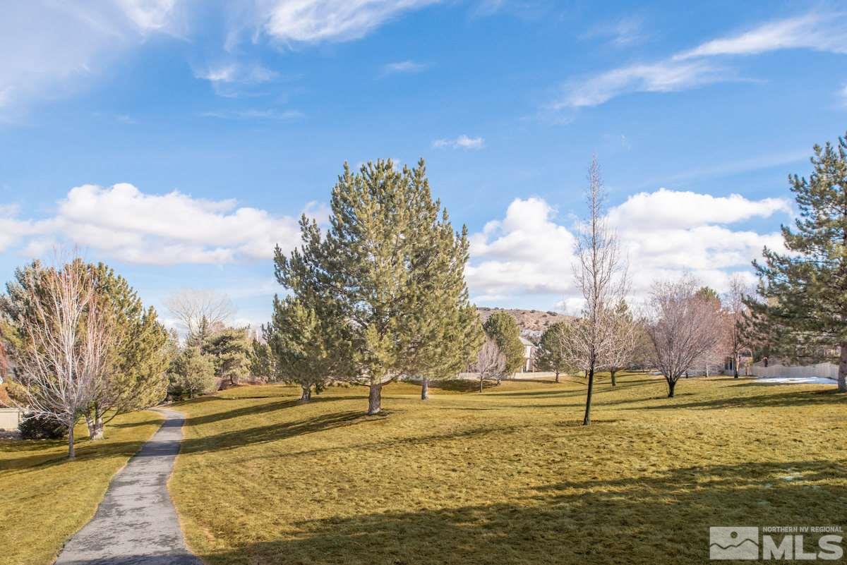 1673 Aspen Creek Road Reno, NV 89519 - Photo 36 of 40 a view of a yard with lake view