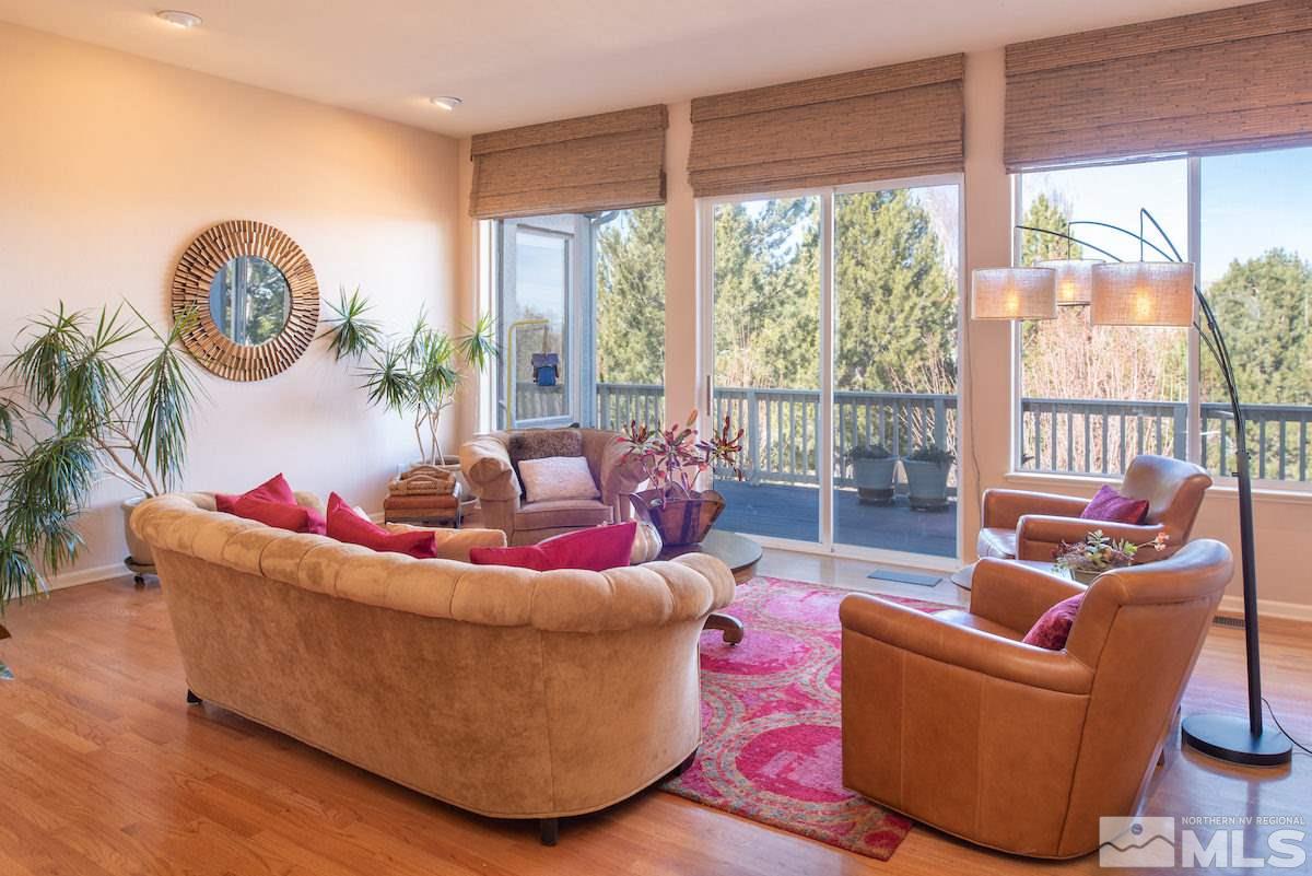 1673 Aspen Creek Road Reno, NV 89519 - Photo 8 of 40 a living room with furniture and a large window