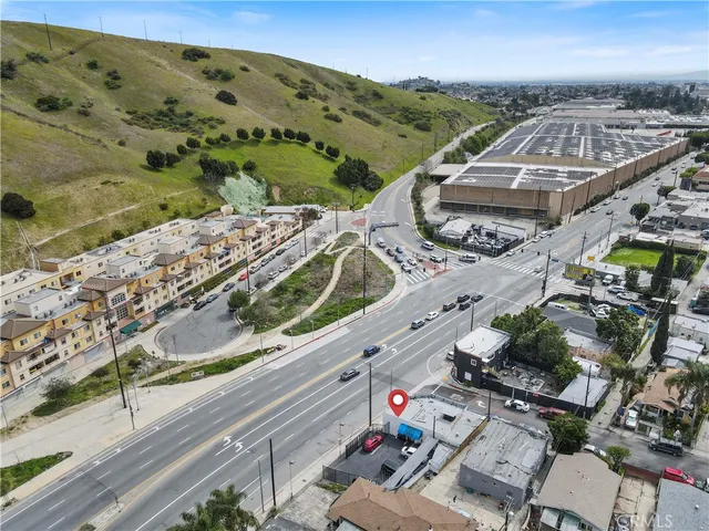 a view of a building with sitting area
