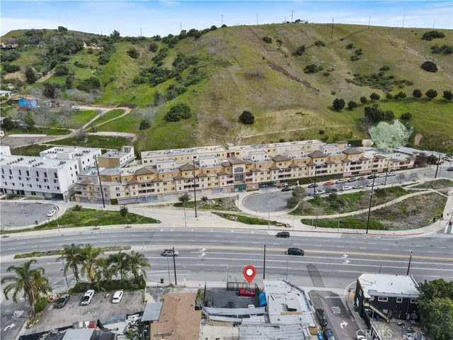 a view of a bathroom from a hallway