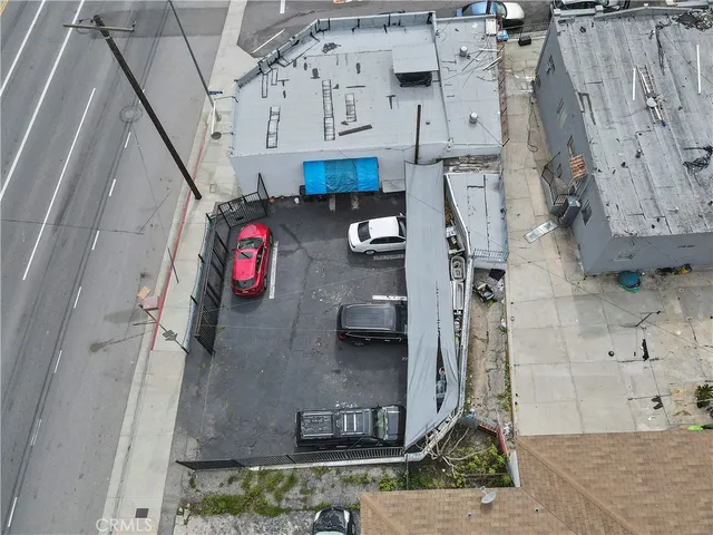a bathroom with a shower sink and mirror
