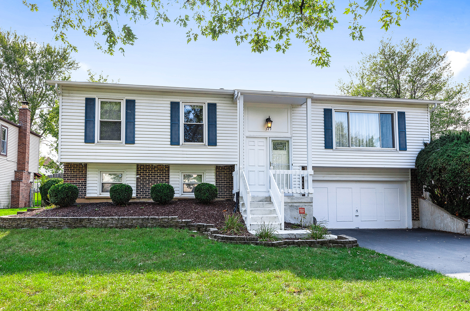 349 North Pinecrest Road Bolingbrook, IL 60440 - Photo 1 of 25 front view of a house with a yard