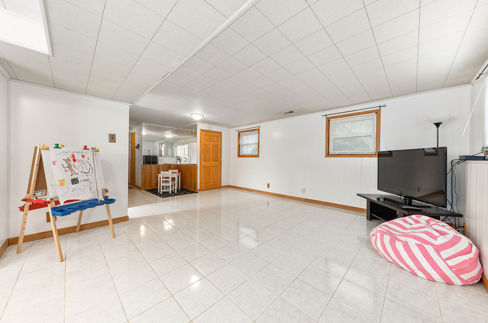 349 North Pinecrest Road Bolingbrook, IL 60440 - Photo 22 of 25 a view of a livingroom with workspace and a couch