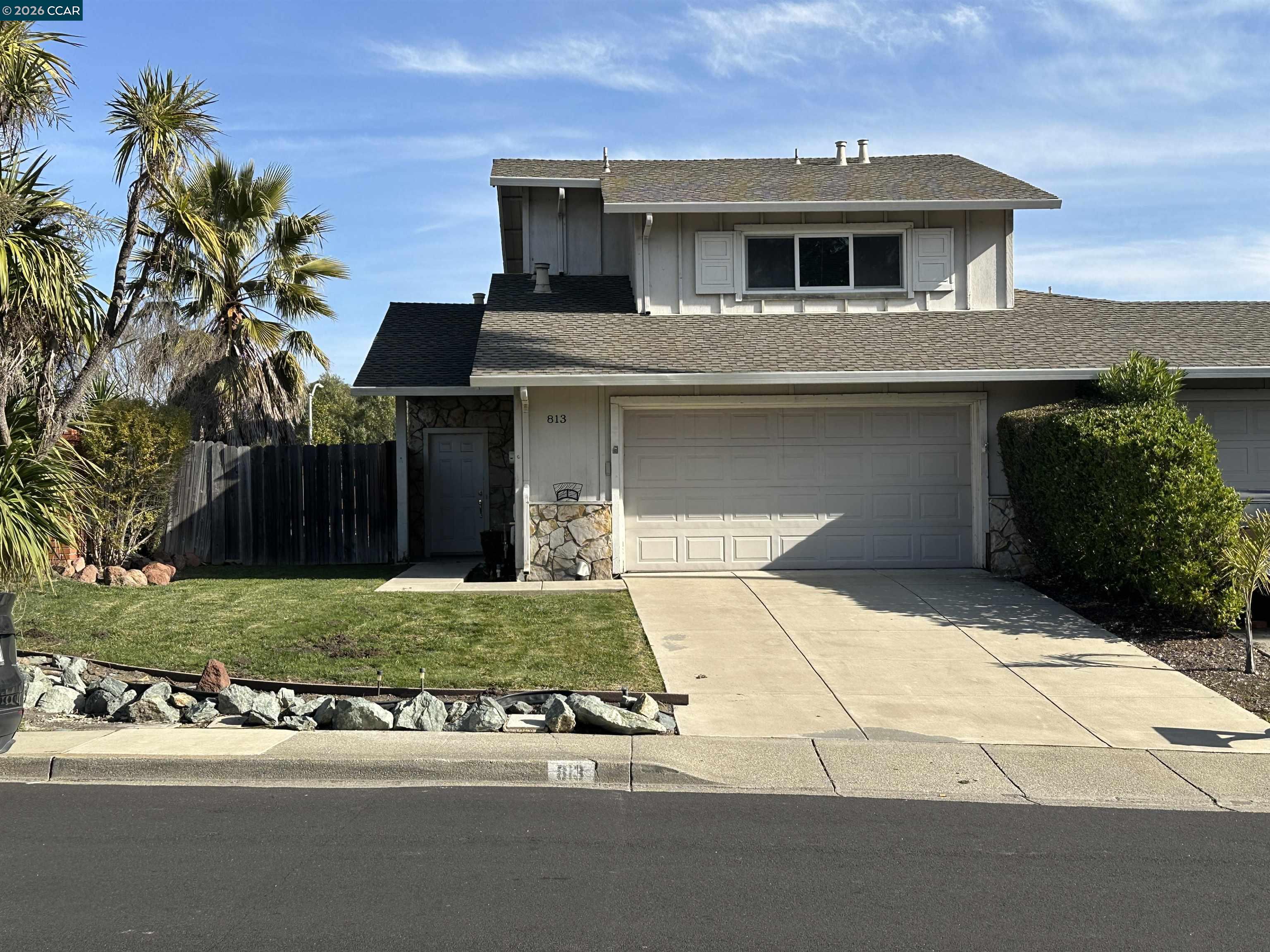 813 Ladera Corte San Ramon, CA 94583 - Photo 1 of 1 a front view of a house with a yard and garage
