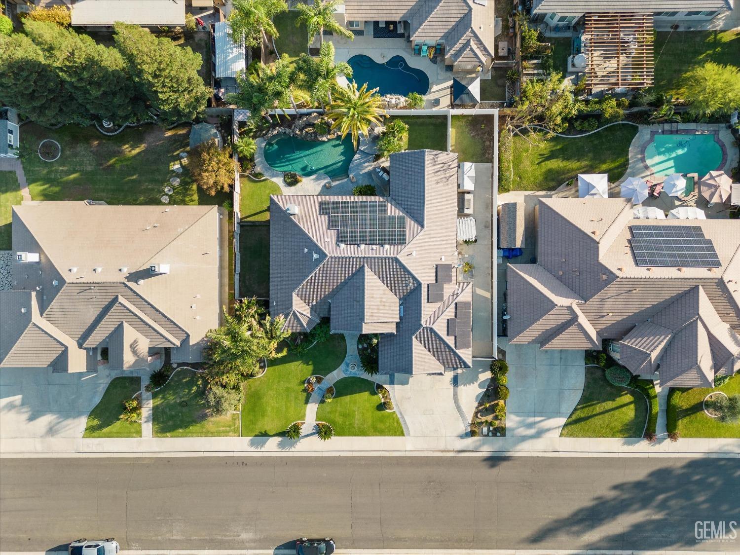 Undisclosed Address Bakersfield, CA 93314 - Photo 33 of 34 an aerial view of a house with a yard and a fountain