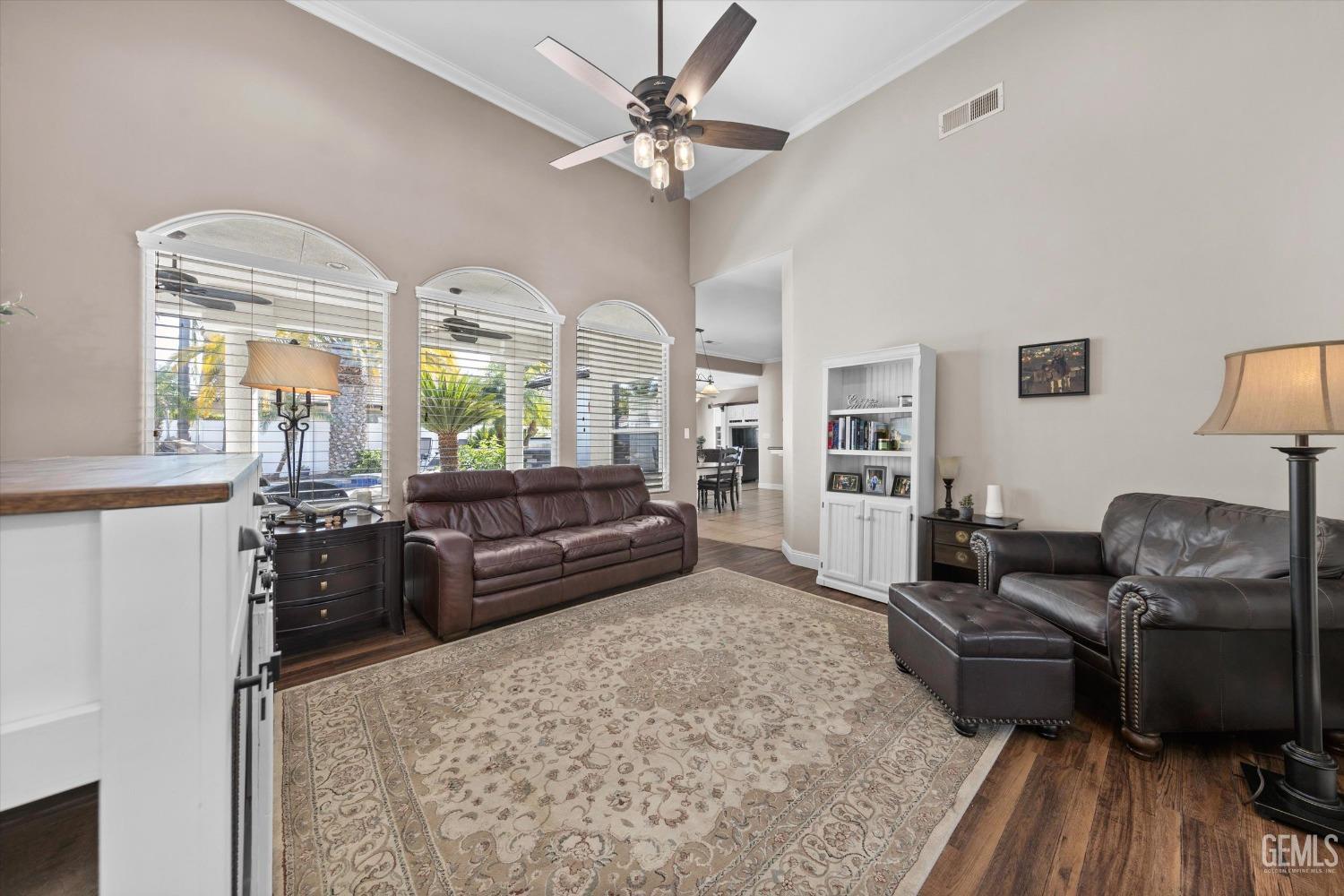 Undisclosed Address Bakersfield, CA 93314 - Photo 5 of 34 a living room with furniture and wooden floor