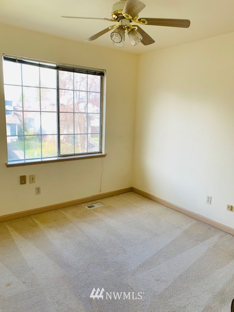 2309 Southeast 8th Drive Renton, WA 98057 - Photo 10 of 14 an empty room with a window