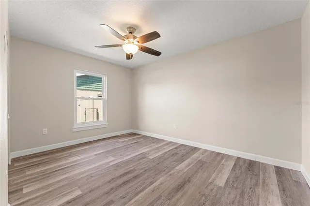 a bathroom with a shower and toilet