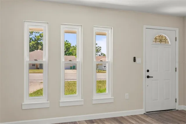a view of a house with swimming pool