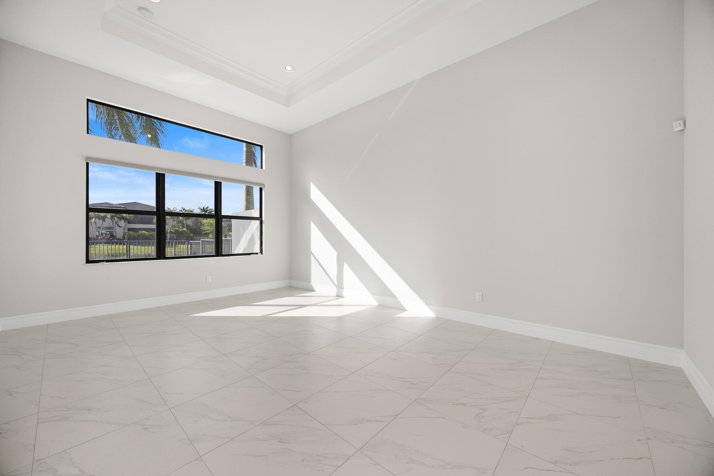 9168 Benedetta Place Boca Raton, FL 33496 - Photo 17 of 51 a view of an empty room with windows