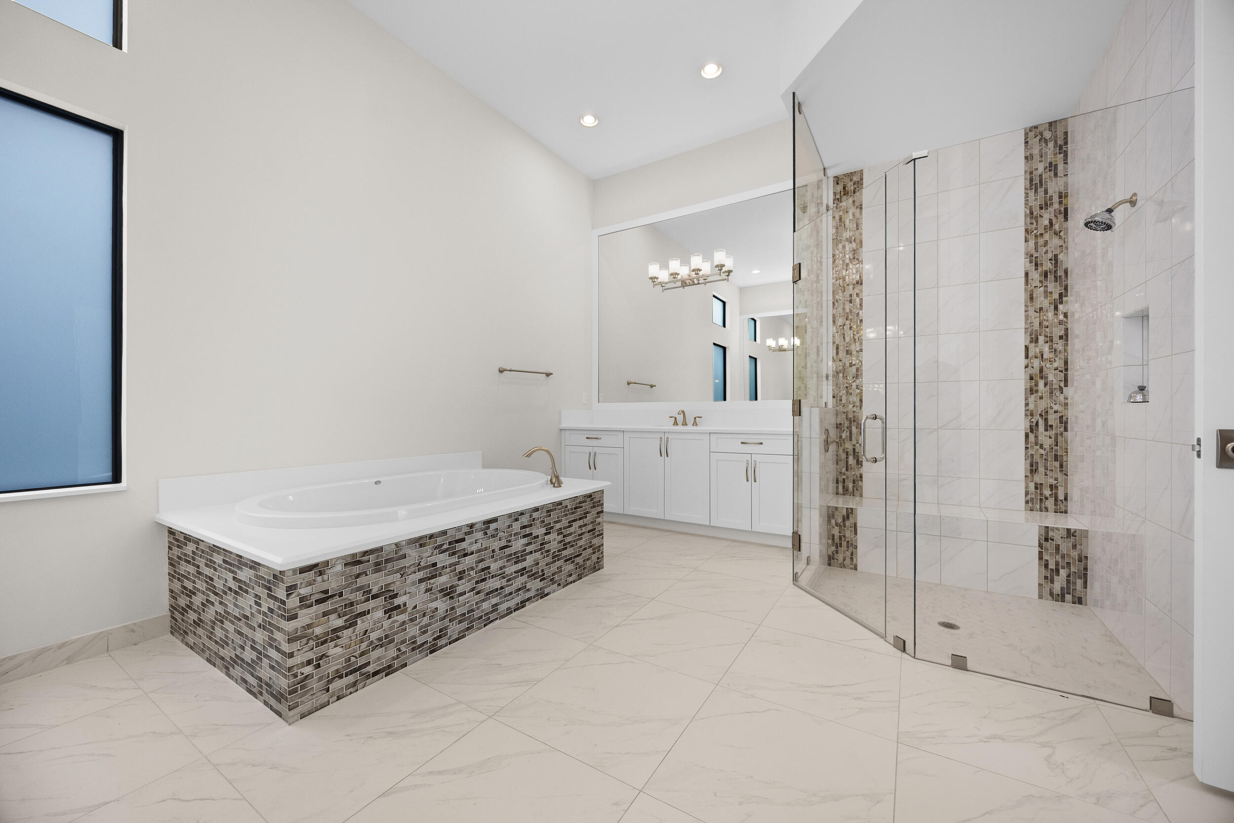 9168 Benedetta Place Boca Raton, FL 33496 - Photo 19 of 51 a bathroom with a bathtub and shower