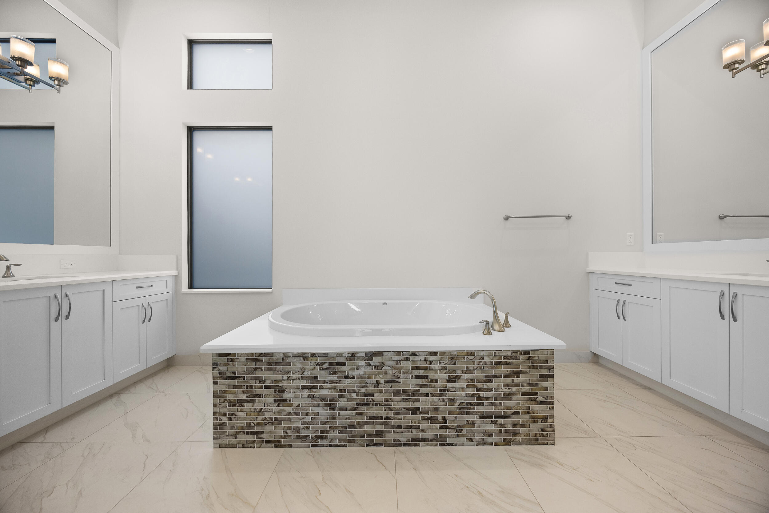 9168 Benedetta Place Boca Raton, FL 33496 - Photo 20 of 51 a bathroom with a sink and a mirror