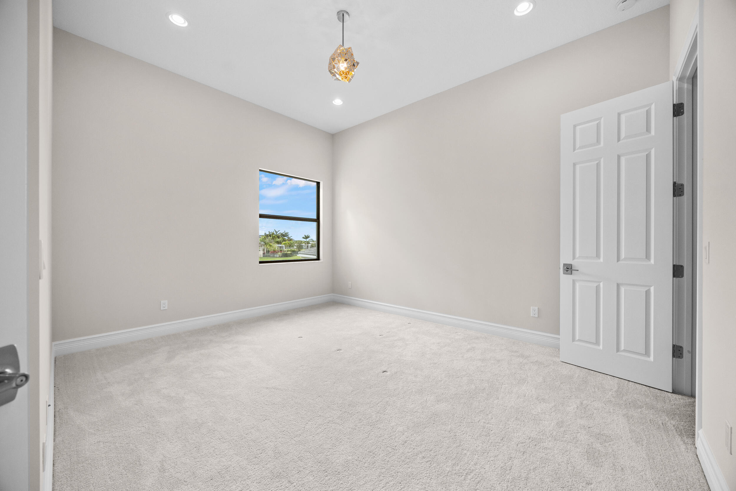 9168 Benedetta Place Boca Raton, FL 33496 - Photo 22 of 51 an empty room with windows