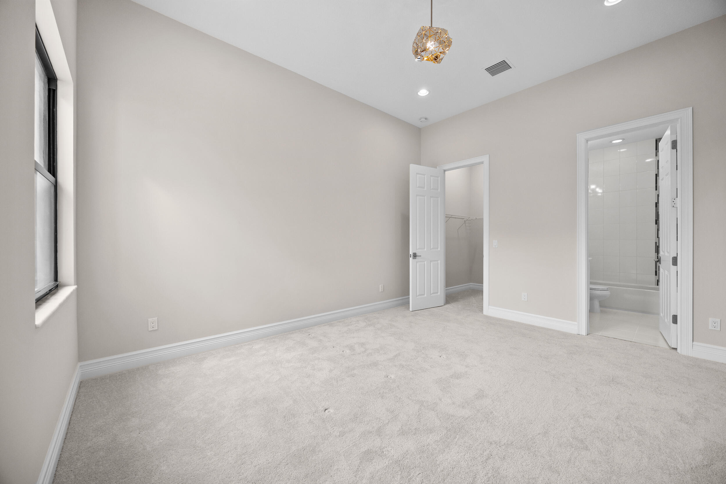 9168 Benedetta Place Boca Raton, FL 33496 - Photo 23 of 51 an empty room with a bathroom
