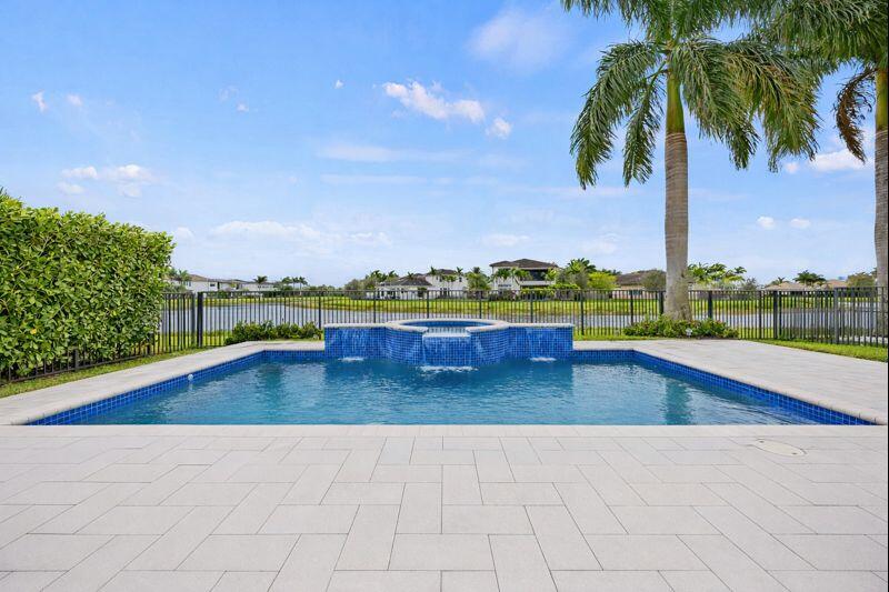 9168 Benedetta Place Boca Raton, FL 33496 - Photo 29 of 51 a view of a swimming pool and an outdoor seating