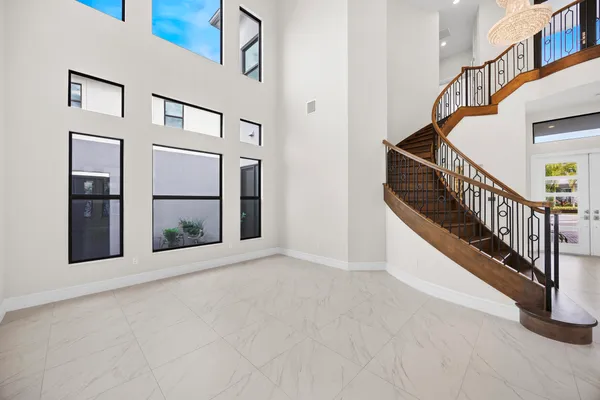a view of a hallway with staircase