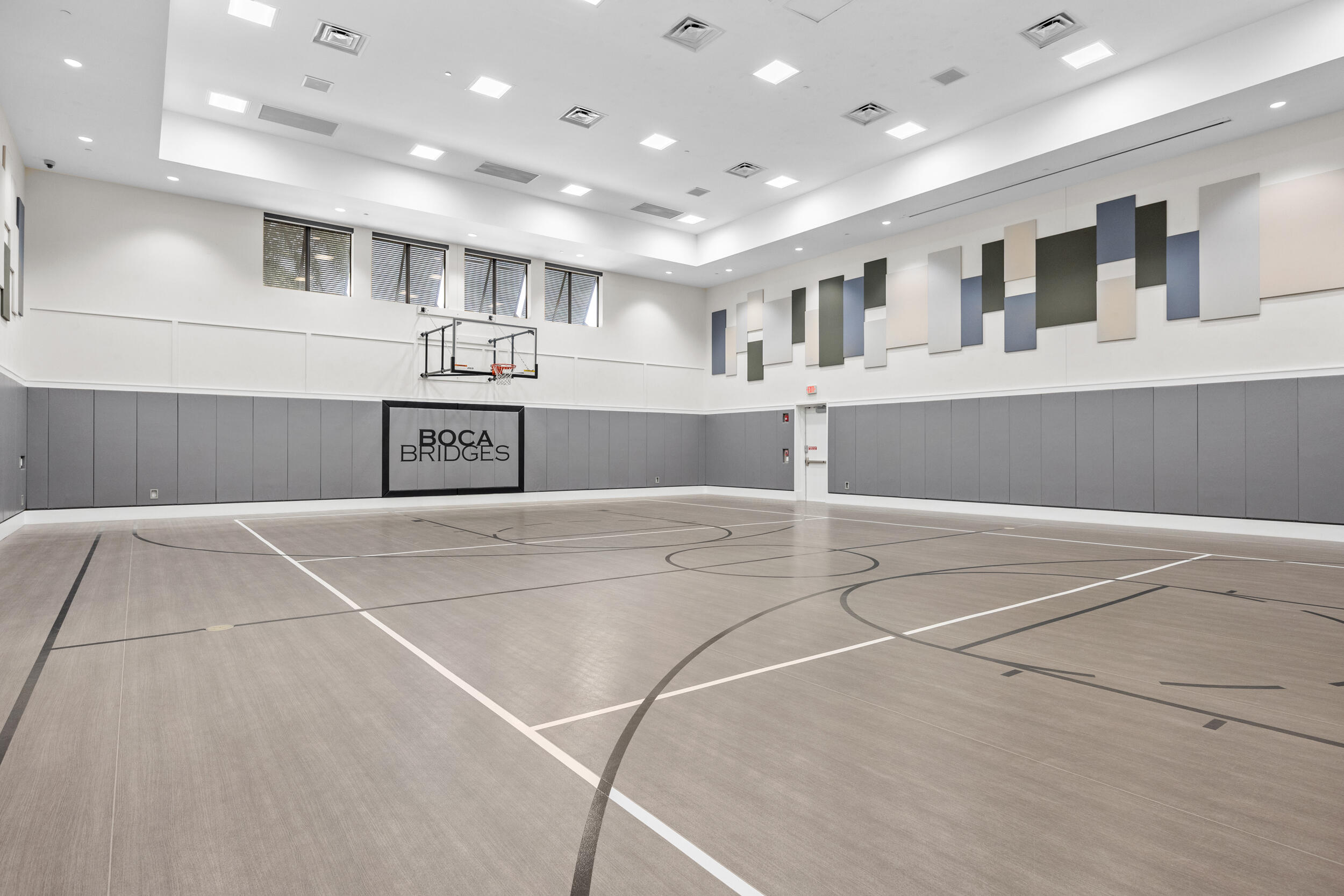 9168 Benedetta Place Boca Raton, FL 33496 - Photo 39 of 51 a large white kitchen with kitchen island a sink stainless steel appliances and cabinets