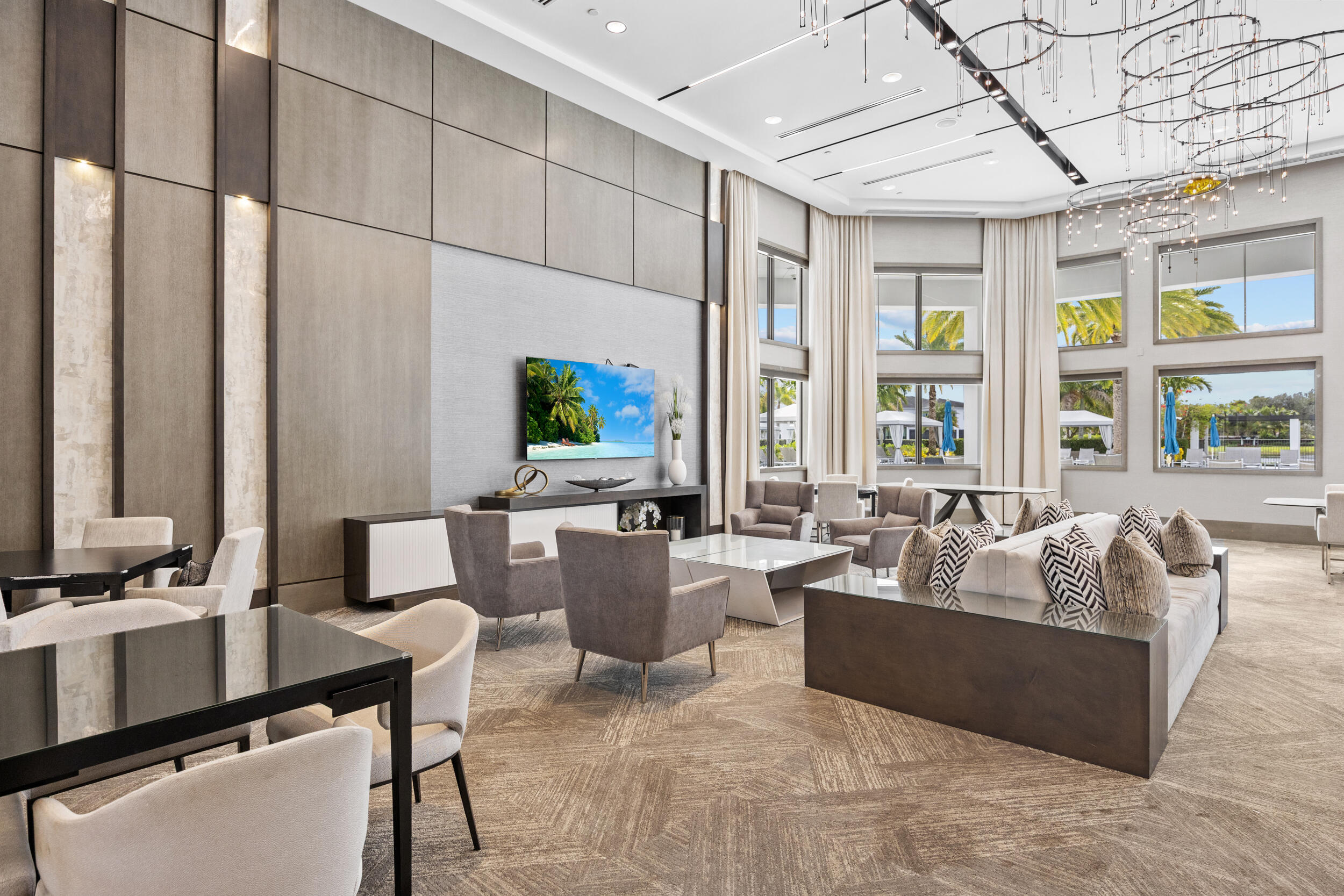 9168 Benedetta Place Boca Raton, FL 33496 - Photo 42 of 51 a living room with furniture and large windows