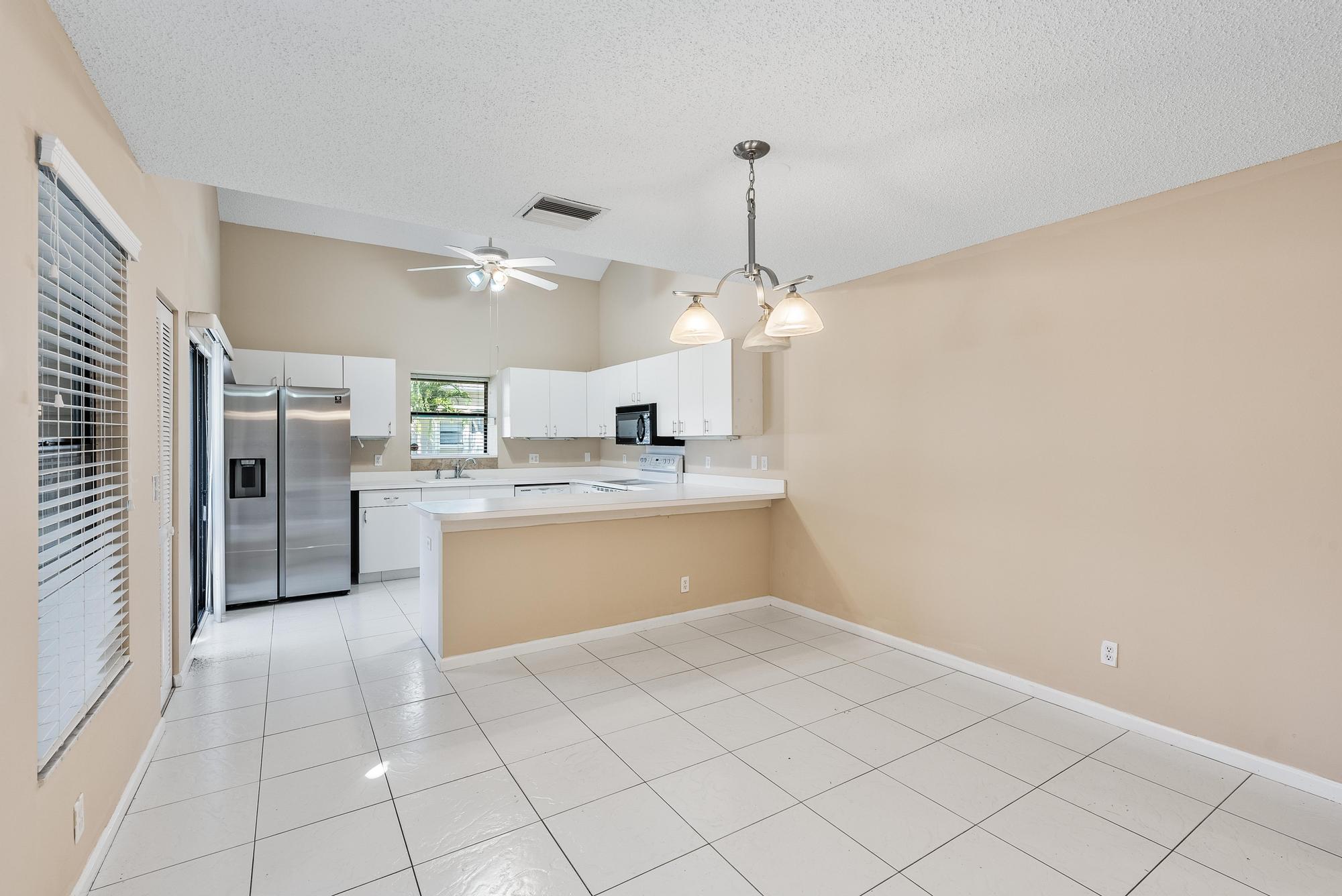 1102 Summerwinds Lane, Unit 1102 Jupiter, FL 33458 - Photo 2 of 26 1102 Summerwinds Ln -8