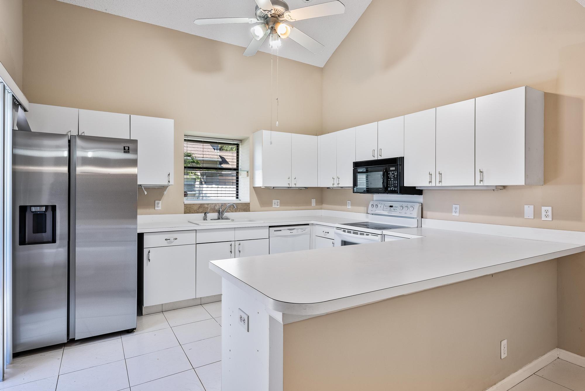 1102 Summerwinds Lane, Unit 1102 Jupiter, FL 33458 - Photo 3 of 26 1102 Summerwinds Ln -9