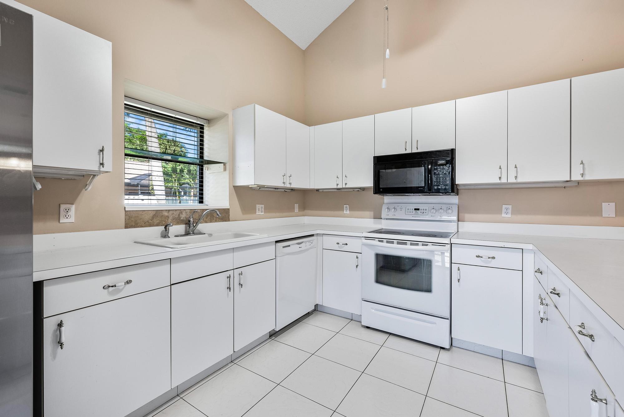 1102 Summerwinds Lane, Unit 1102 Jupiter, FL 33458 - Photo 4 of 26 1102 Summerwinds Ln -10