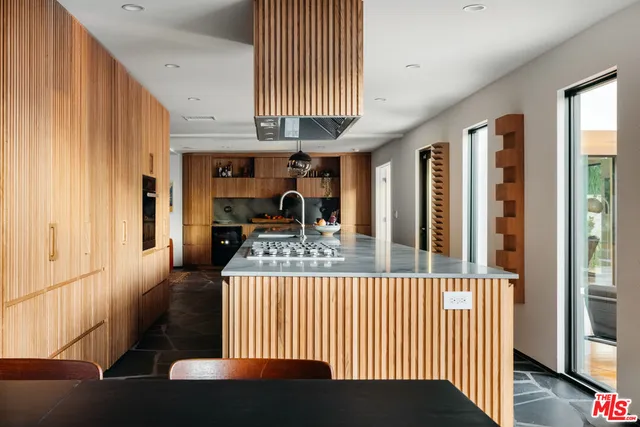 a view of a living room and entryway