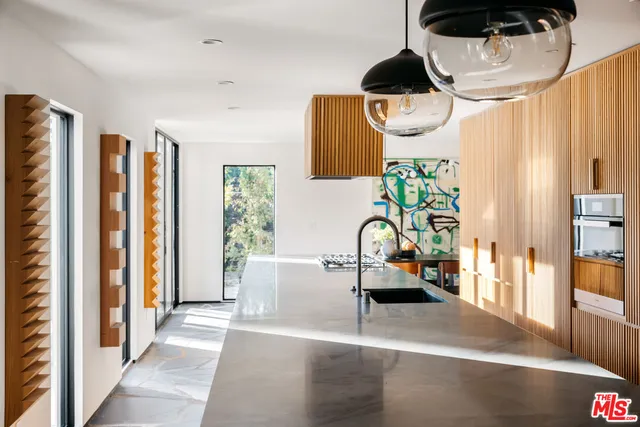 a view of a living room and dining room