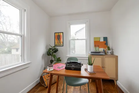 a room with furniture and window