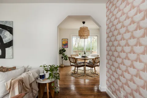a view of a livingroom with furniture and wooden floor