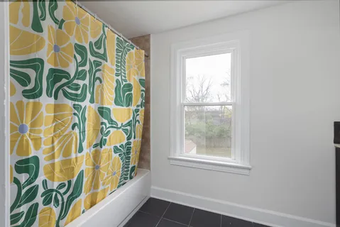 a view of walk in closet with window