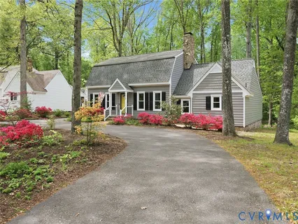 a front view of a house with yard