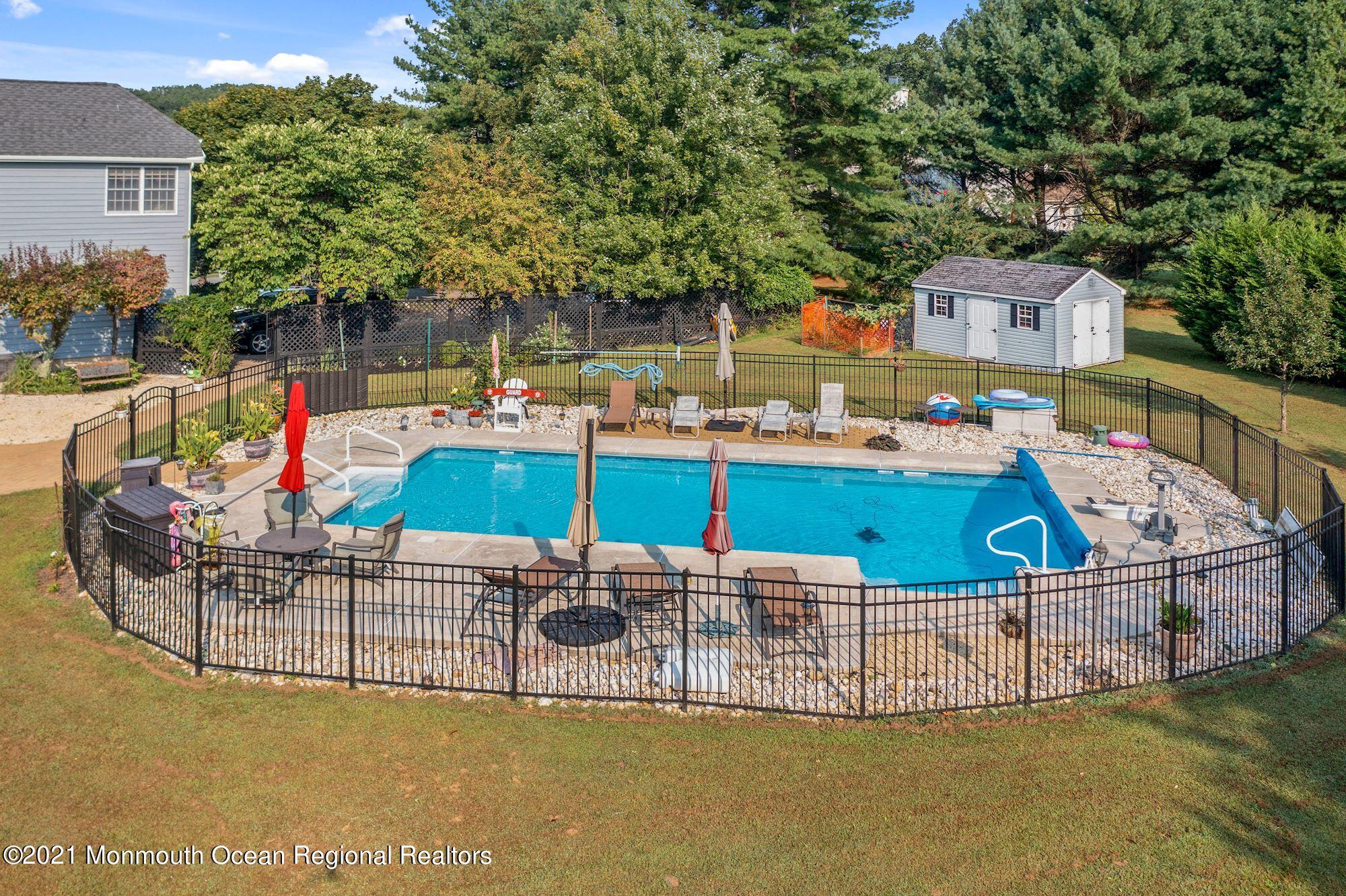 20 Highland Ridge Road Manalapan, NJ 07726 - Photo 6 of 35 Enclosed pool