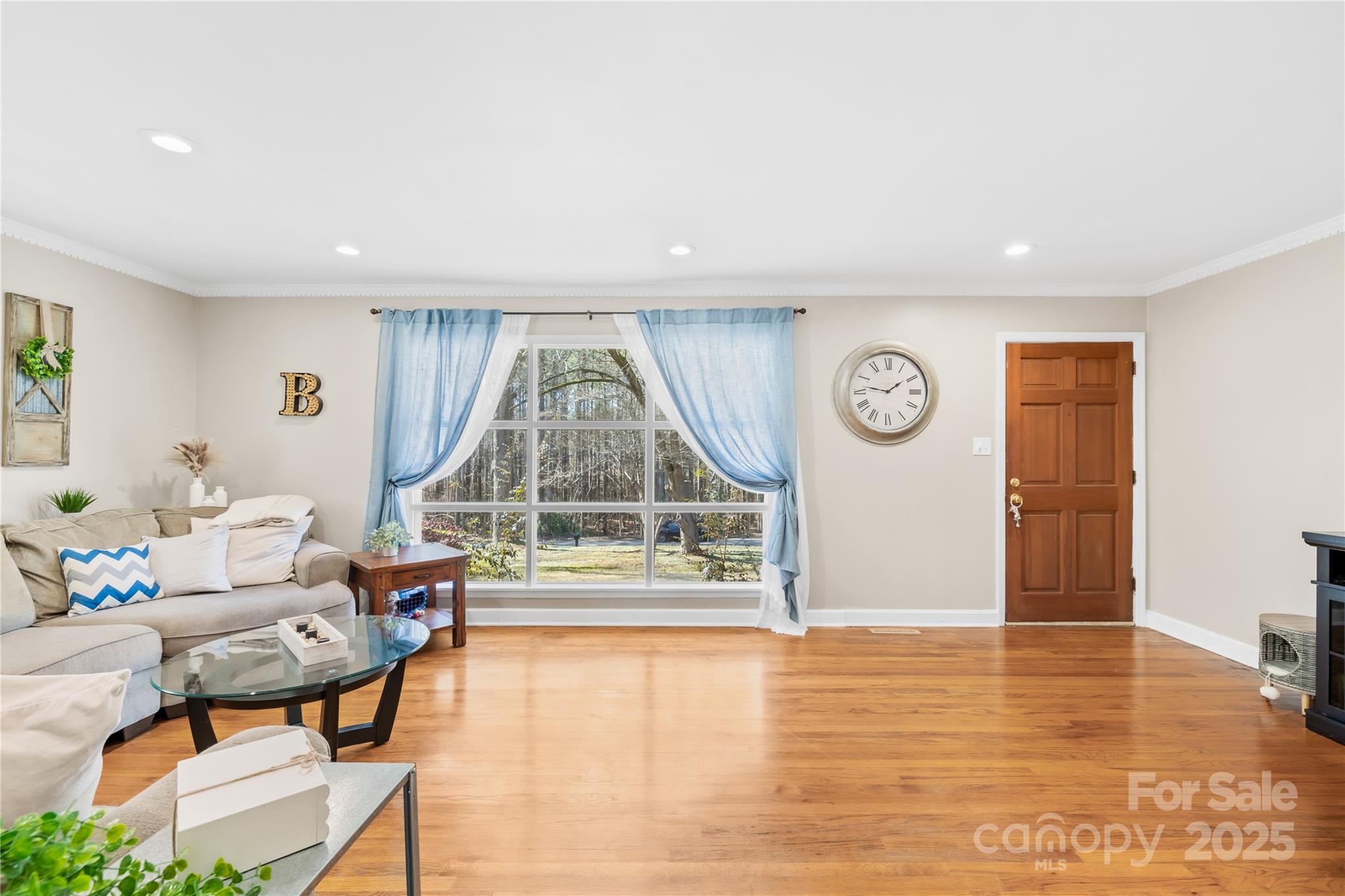 827 Lakeside Circle Lancaster, SC 29720 - Photo 6 of 31 a living room with furniture and a window