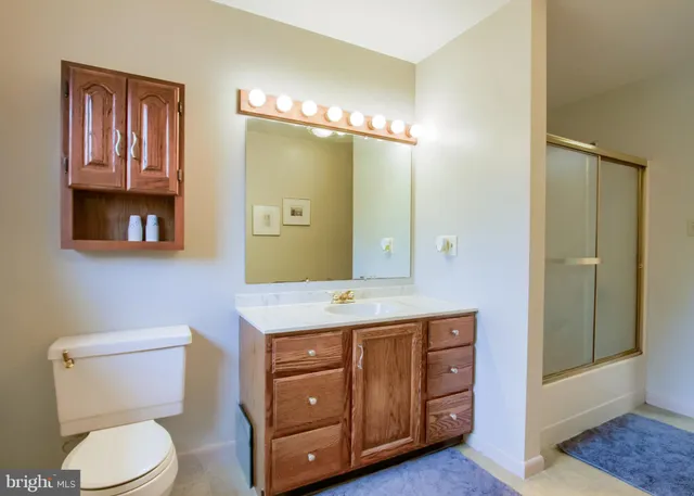 a large white room with a rug