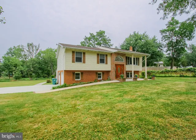 a house view with a garden space