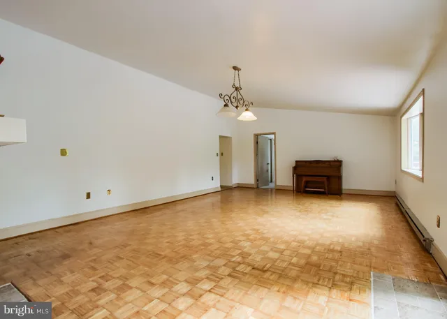 a view of a room with an empty space