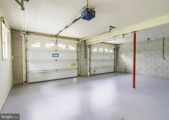 a view of a house with a yard and deck