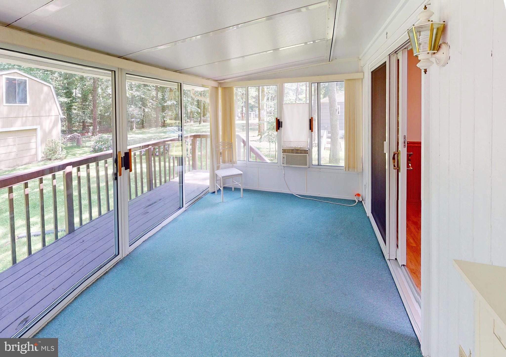 3721 Nile Road Davidsonville, MD 21035 - Photo 11 of 34 Sunroom has air conditioner for extra comfort.