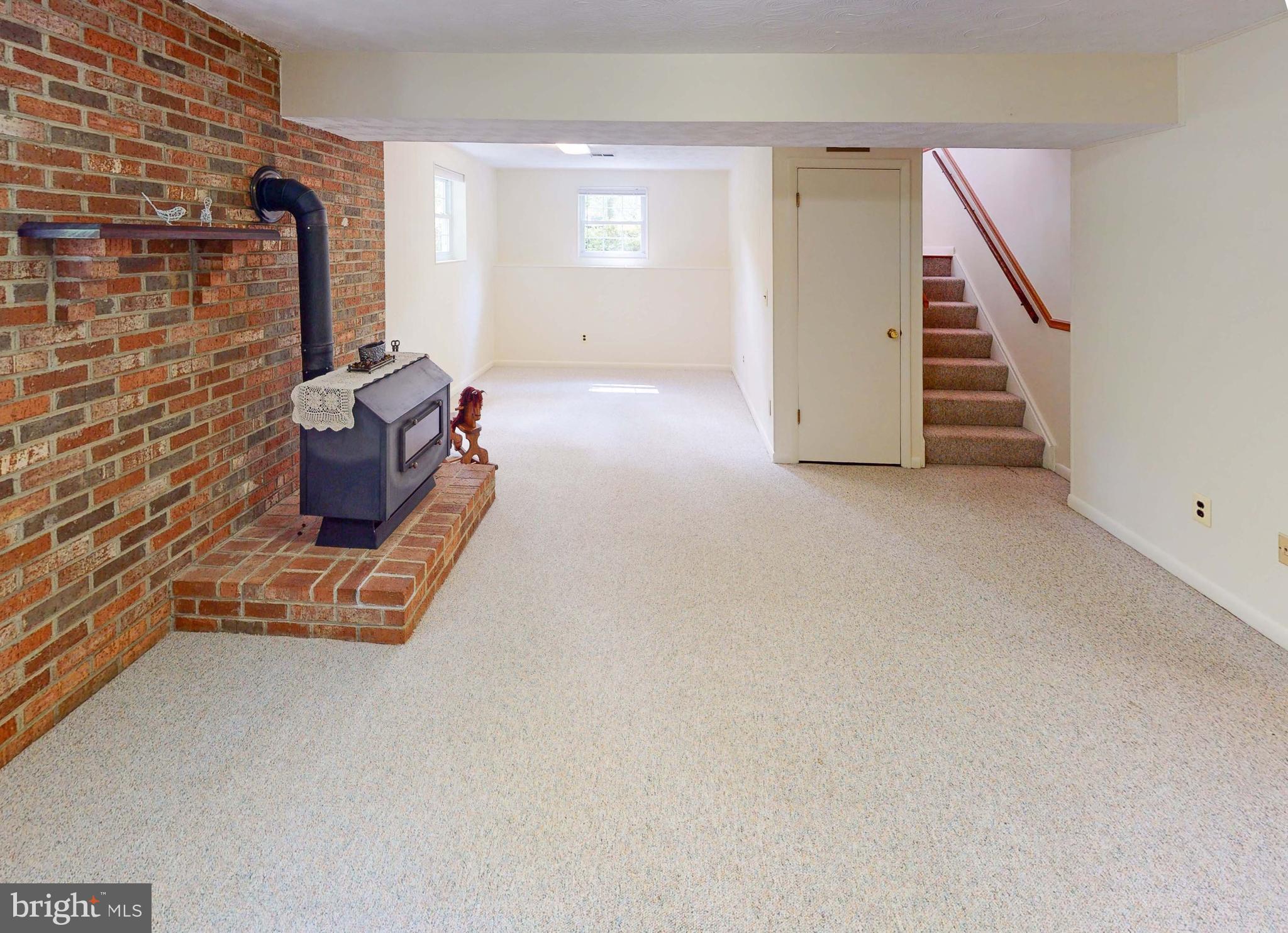 3721 Nile Road Davidsonville, MD 21035 - Photo 20 of 34 Wood burning stove in family room for cozy warmth!