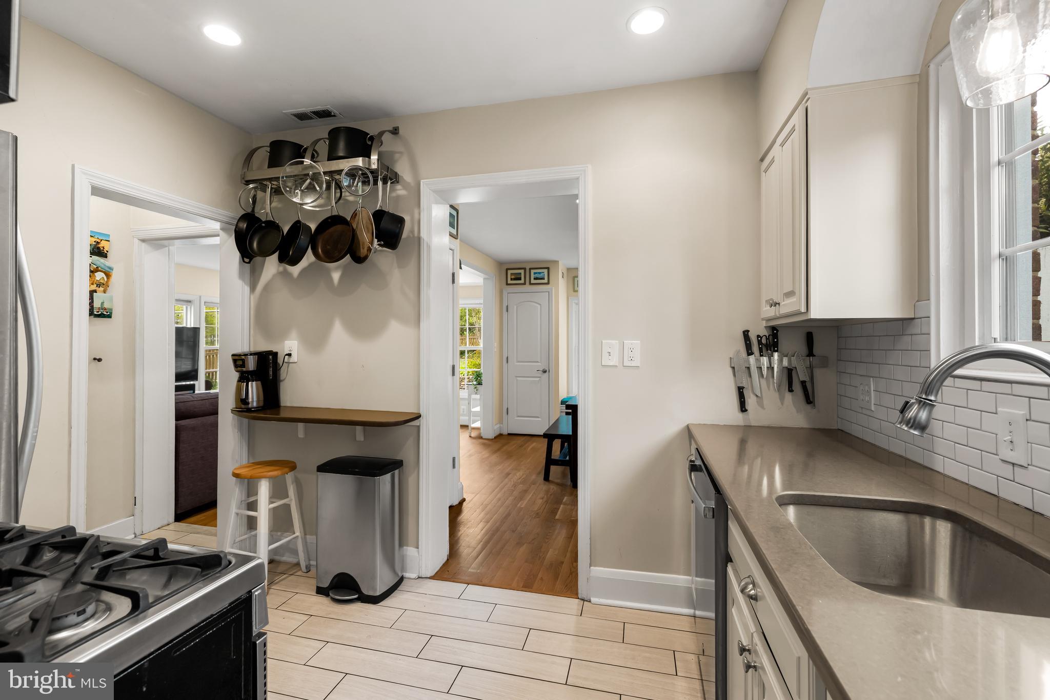 700 Regester Avenue Baltimore, MD 21212 - Photo 17 of 43 a kitchen with a sink appliances and cabinets