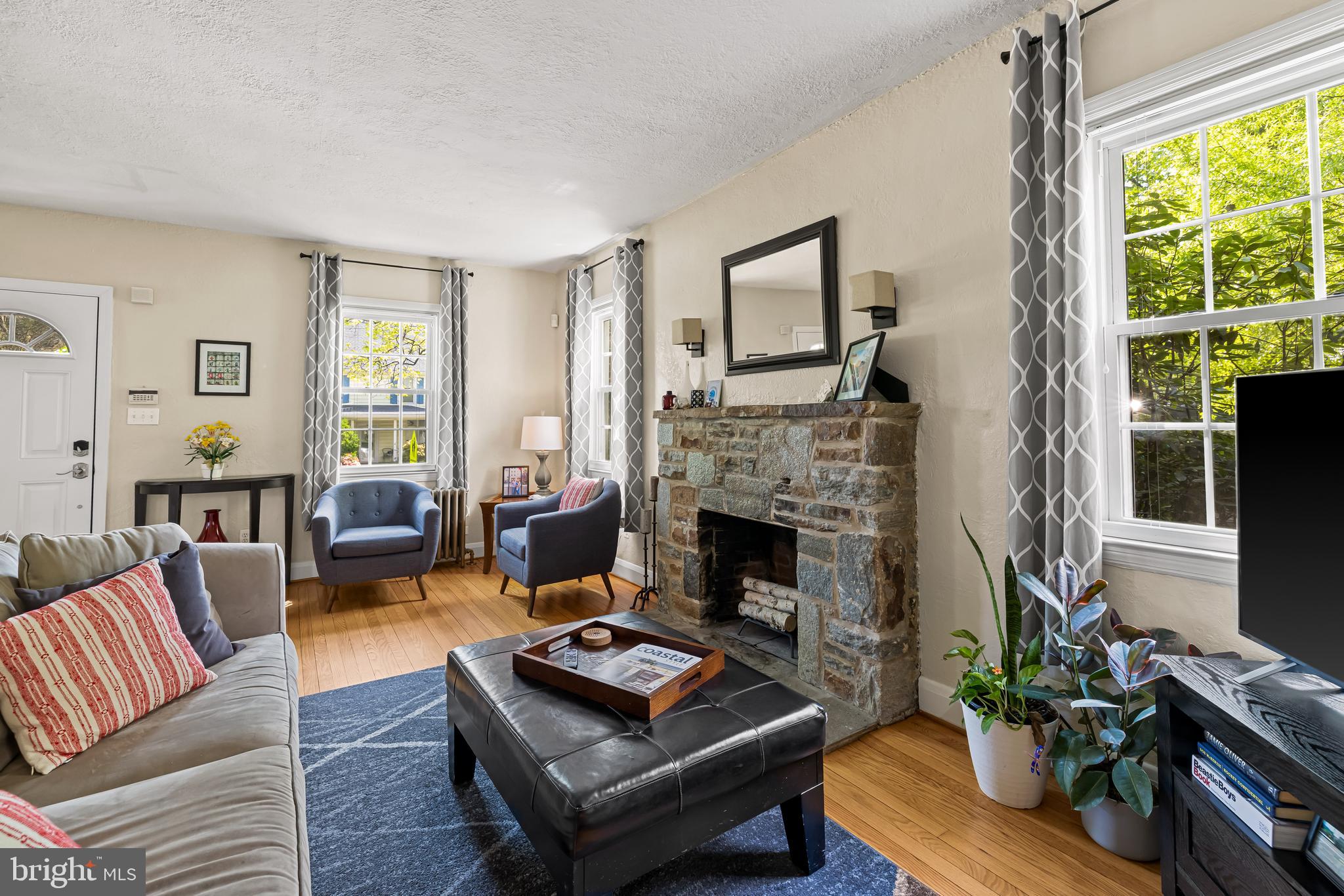 700 Regester Avenue Baltimore, MD 21212 - Photo 24 of 43 a living room with furniture fireplace and a large window