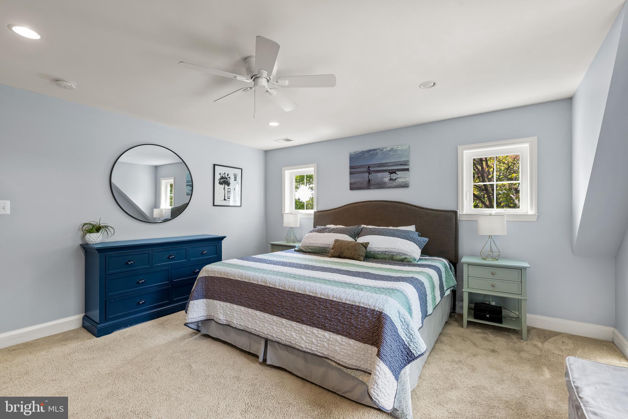 700 Regester Avenue Baltimore, MD 21212 - Photo 28 of 43 a bed room with a bed and a mirror