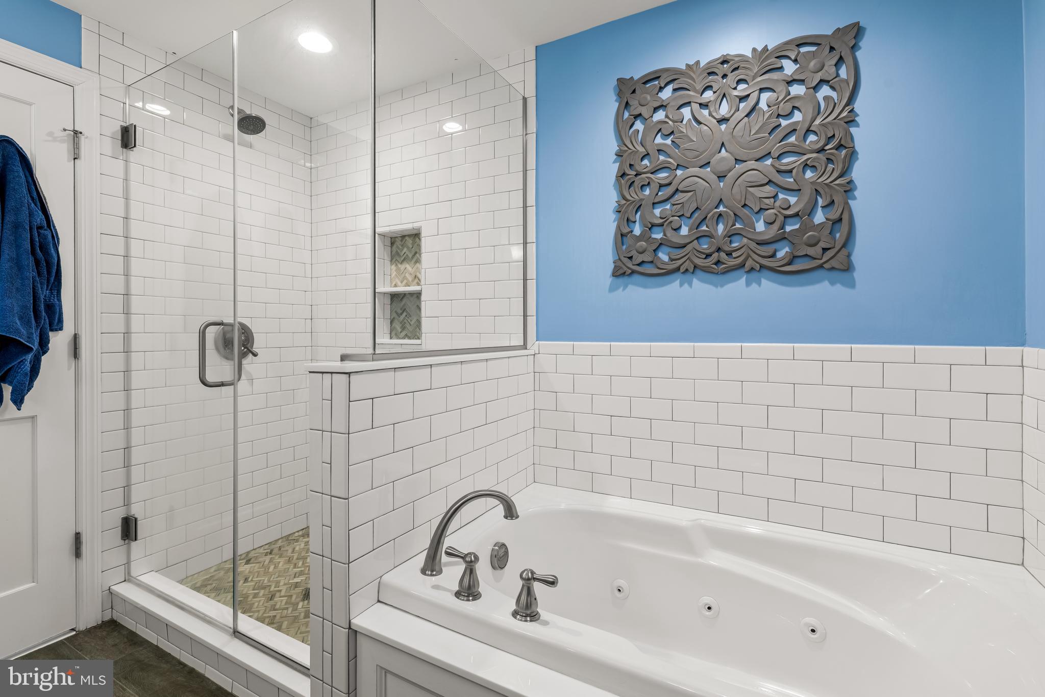 700 Regester Avenue Baltimore, MD 21212 - Photo 30 of 43 a bathroom with a bathtub and shower