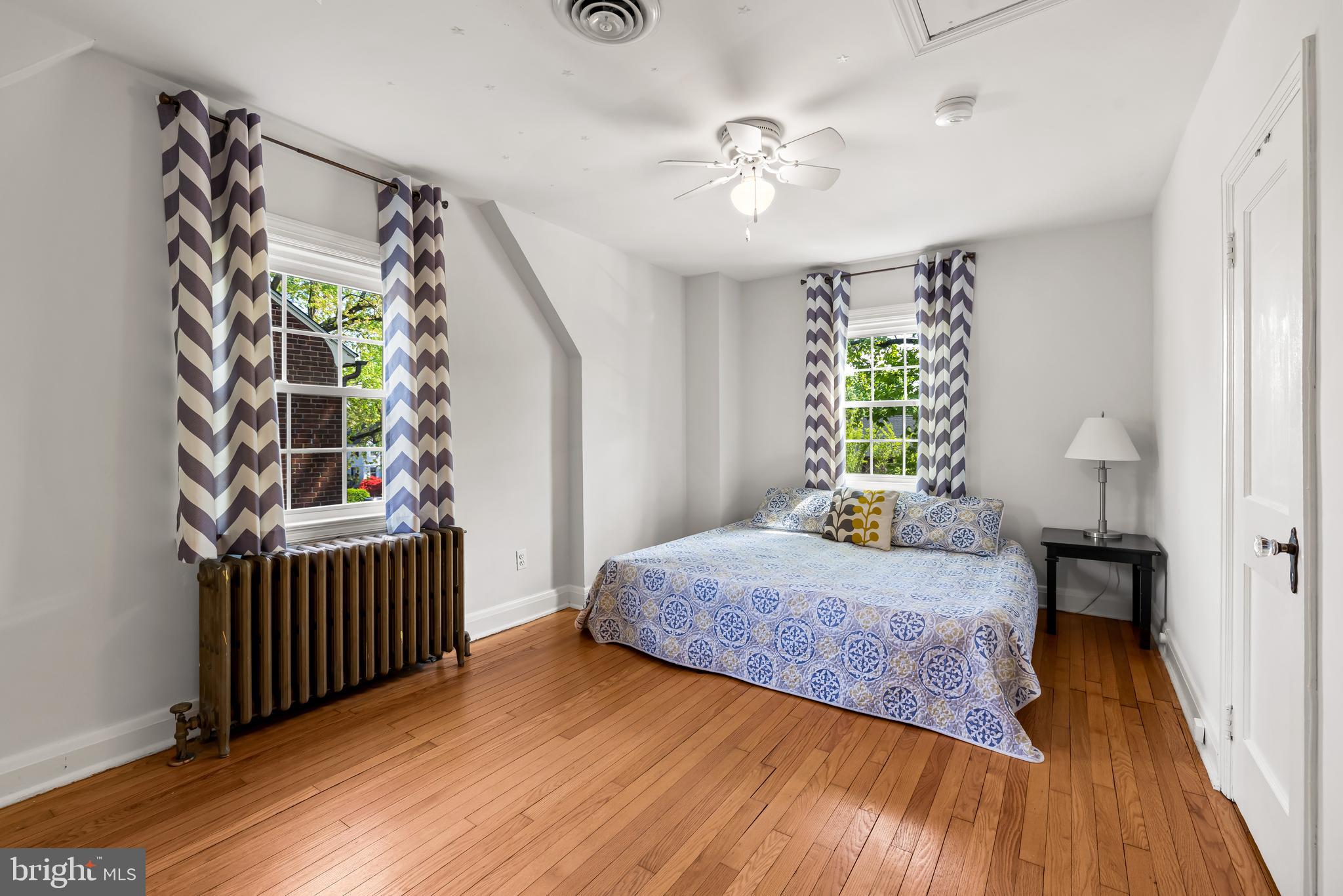 700 Regester Avenue Baltimore, MD 21212 - Photo 34 of 43 a bedroom with a bed and a window