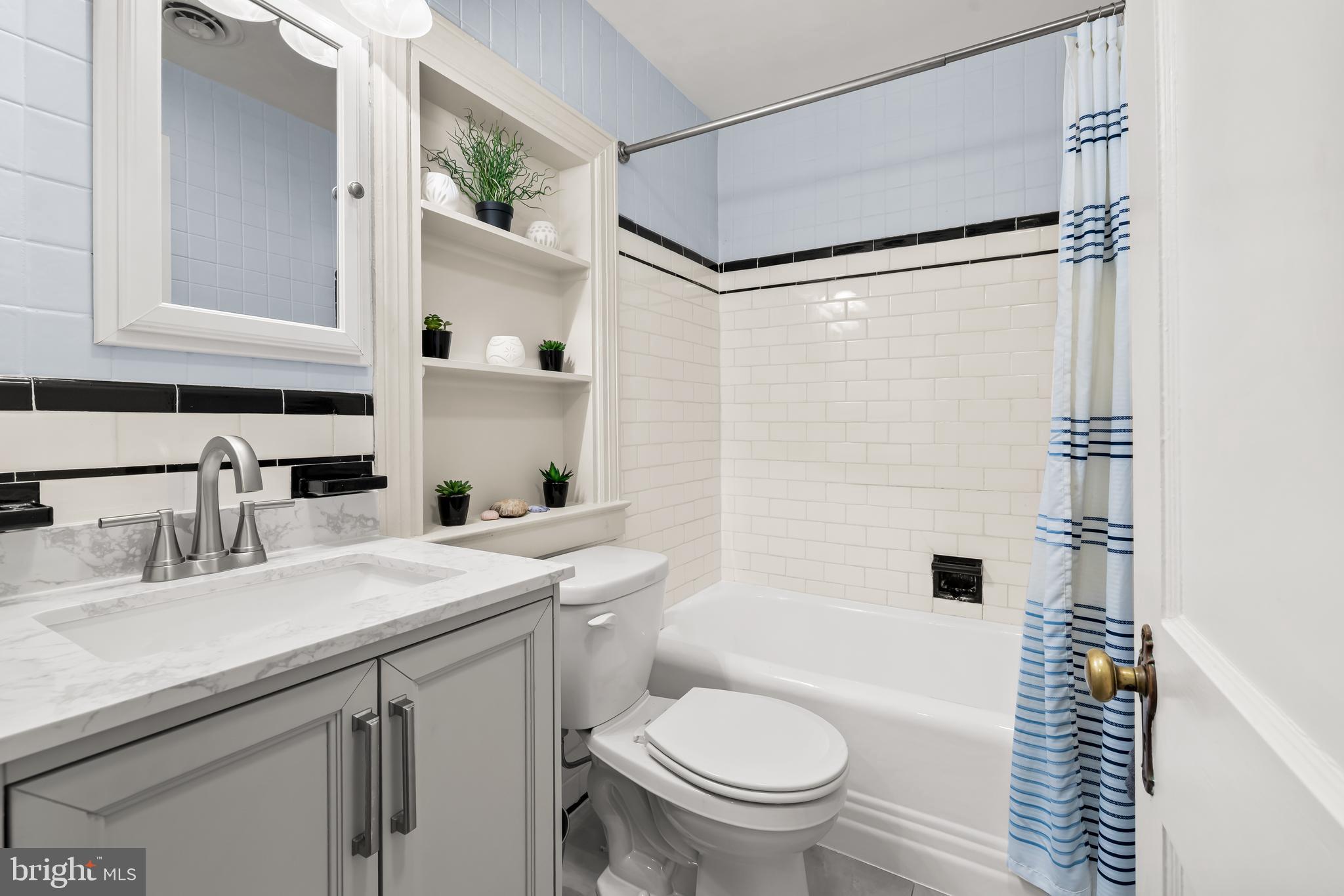 700 Regester Avenue Baltimore, MD 21212 - Photo 35 of 43 a bathroom with a sink toilet and shower