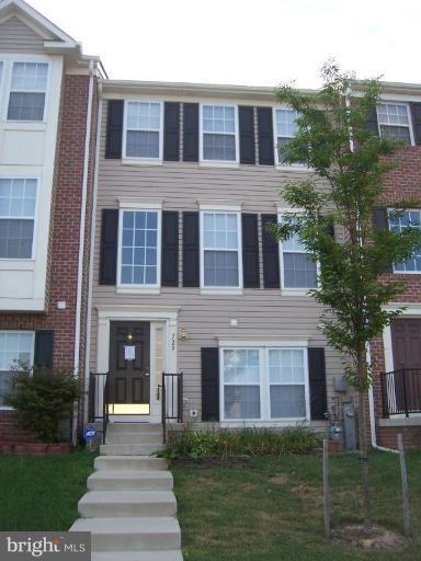 729 Compass Road East Middle River, MD 21220 - Photo 1 of 10 a front view of a house with garden